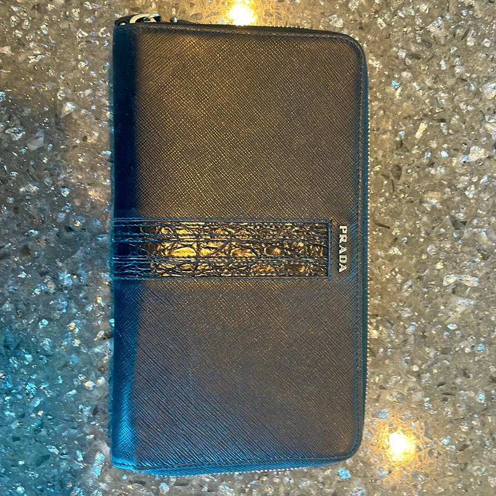Prada oversized black leather wallet with croc accent textured leather.